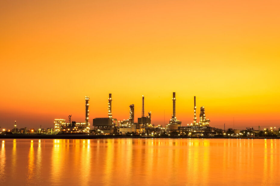oil refinery at sunset